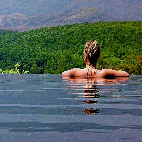 Woman in Infinity or negative edge pool